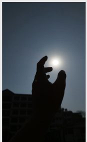 Hand reaching for the moon